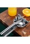 This manual citrus juicer, made of 304 stainless steel, is perfect for lemons and oranges and is ideal for the kitchen. - 2
