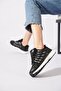 Vakos women's black sneakers with side stripe detail - 2