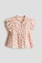 Flutter-sleeved cotton blouse