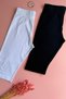 Woman |   2 Pieces of Black and White Cotton Lycra Leggings Above the Knee