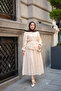 Women's Skirt with Ruffles and Stone Button Detail Set in Cream