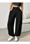 Women's high-waisted, wide-leg viscose pants with drawstring waist and pockets. - 2