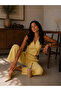 Women's Yellow Palazzo Trousers with Buttoned Flap Pockets, Elegant and Casual - 4