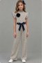 Girl's Beige Jumpsuit with Ruffle Detail on the Collar and Shoulders and Polka Dots All over