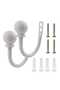 A pair of lightweight metal curtain hooks - vintage wall-mounted curtain tiebacks, white