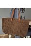 Hand-Knitted Oval Base Shoulder Bag with String on Brown Paper. - 5