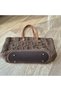 Hand-Knitted Oval Base Shoulder Bag with String on Brown Paper. - 2