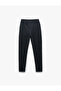 Pocketed, Belted, and Tie-Waist Style Sweatpants with a Tailored Look. - 4