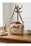 The New Definition of Everyday Chic, This Premium Textured Canvas Bag Complements Your Multi-Compartment Style.