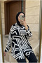 تونيك نسائي مريح بأزرار ونقشات متباينة (أمامي 80 / خلفي 85)