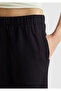 Women's black viscose blend elastic waist curled leg pants - 6