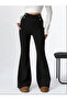 Black High-Waisted Flare Trousers with Button Detail