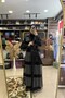 عباءة مزينة بخرز الرمل