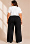 Oversized, loose-fit palazzo pants with elastic waist, drawstring, and wide legs - black - 4