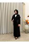 تنورة نورا بجيوب باللون الأسود - 2