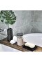 Two silicone soap dishes with drain trays, a sink soap holder, and a black soap dish. - 5