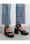 Women's ankle-tie platform heels with criss-cross strap detail