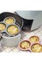 A set of 3 non-stick silicone egg molds, each with three cavities, suitable for air fryers of 6 liters or more. - 4