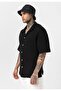 Oversize short sleeve knit shirt with pocket detail - 4