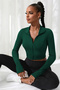 Women's Green Long Sleeve Zippered Finger Snap Detailed Stand Collar Crop Top Blouse