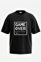 تي شيرت قطني أسود كبير الحجم مطبوع عليه تصميم Game Over على الظهر
