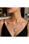 Silver Color Luxurious Openwork Necklace with a Stylized Figure