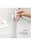 4-in-1 travel shampoo & conditioner dispenser, leak-proof & refillable silicone material, lockable transparent & portable design, air travel, white - 3