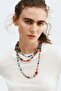 Three-strand beaded necklace
