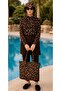 The woman wears a hijab swimsuit. - 5
