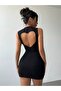 Women's mini dress with heart detail on the back, made from flexible lycra fabric. - 3