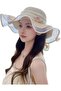 Wide-brimmed straw hat with a wavy brim – a stylish butterfly-strap sun hat | perfect for beach vacations and outdoor trips