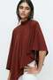 Asymmetric cape top