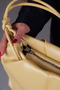 Women's Yellow Shiny Textured Knot Detailed Large Internal Volume Adjustable Cross Strap Shoulder Bag - 4