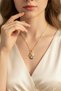 Yellow Color Steel Necklace with a Cute Character Figure Holding a Flower in a Hat - 3