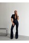 Women's Short Sleeve Spanish Flare Denim Jumpsuit - 4