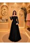 فستان يجسد الأناقة الراقية بتصميم فاخر