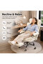 This home office/gaming chair is ergonomically designed with a footrest, adjustable backrest, padded armrests, and adjustable headrest and lumbar support. - 2