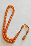 Systematic Stick-Clamping Amber Prayer Beads