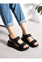 Puckey Black Women's Sandals