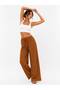 Women's Fabric Embossed Detailed Loose-Fitting Trousers with Wide Legs and Lace-Up Front, Stylish Twist Detail - 4