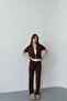 Women's two-piece set with zipper, stone, and stripe detail