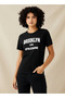 GRAPHIC TEE VARSITY