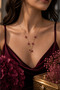 V Model Luxury Steel Necklace with Red Stone Ivy Bow Figure (Gold Color) - 2