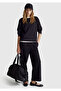 Women's black viscose blend elastic waist curled leg pants - 5