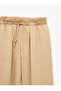 High-Waisted Carrot-Cut Pants with Pockets, Elastic Waistband, and Decorative Laces. - 5