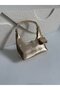 Isabella Model Hand and Women's Shoulder Bag Gold