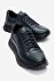 حذاء رياضي رجالي من الجلد الطبيعي، ذو نعل سميك، مصنوع من الجلد الحقيقي من الداخل والخارج.