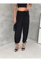 Women's Baggy Cut Trousers with Pockets and Elastic Waist - 2