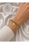 Gold Clover Charm Detailed Twisted Steel Bracelet – Stylish Women's Bracelet with Stones