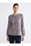 بلوزة منقوشة بياقة دائرية باللون العنابي